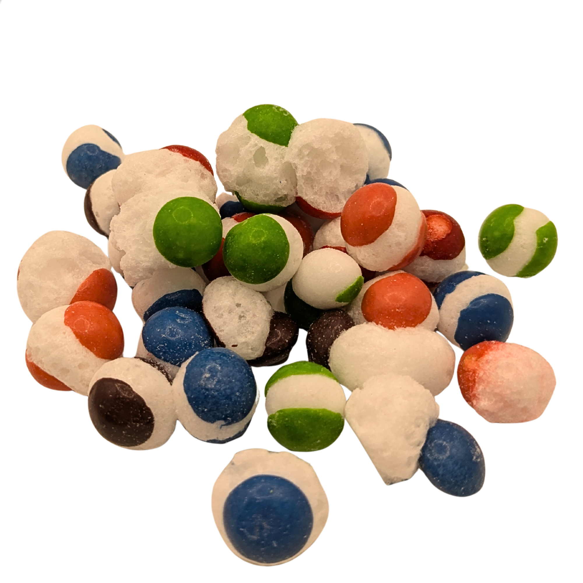 A pile of small round freeze dried candy, including blue, green, orange, and purple-coated pieces, photographed on a plain white background