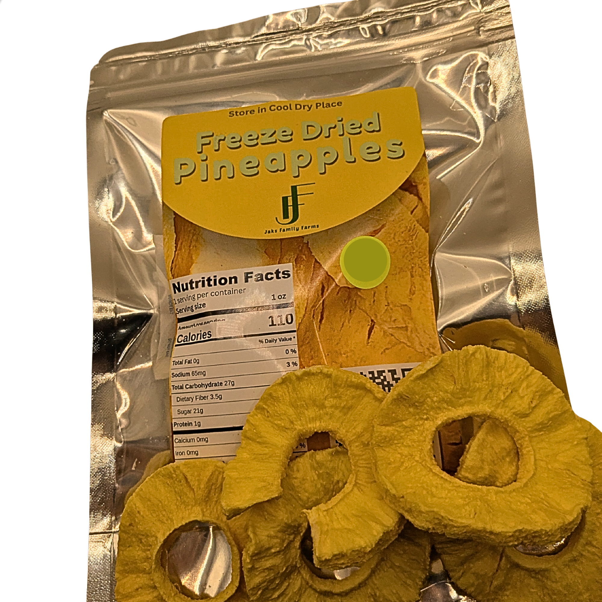 A silver resealable pouch labeled 'Freeze Dried Pineapples' with a yellow front label and a yellow price sticker, shown with several dried pineapple rings in front on a white background.