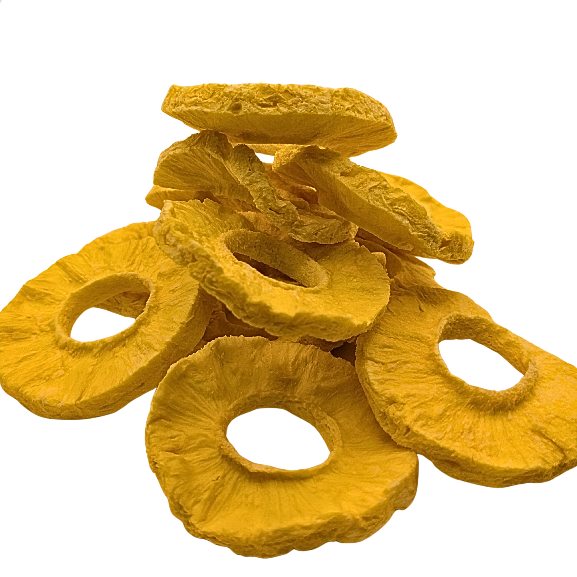 A pile of freeze dried pineapple slices in a bright yellow-orange color, arranged on a plain white background.