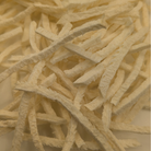 Close up of freeze dried Jicma, which are long, light, and crispy, almost cut like a french fry 
