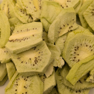 Close-up of sliced freeze dried kiwis with a focus on texture and color.