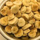 Freeze dried honey cinnamon bananas in a metal bowl