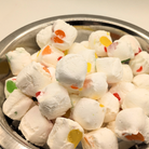 Freeze dried jujube nougats in a metal bowl