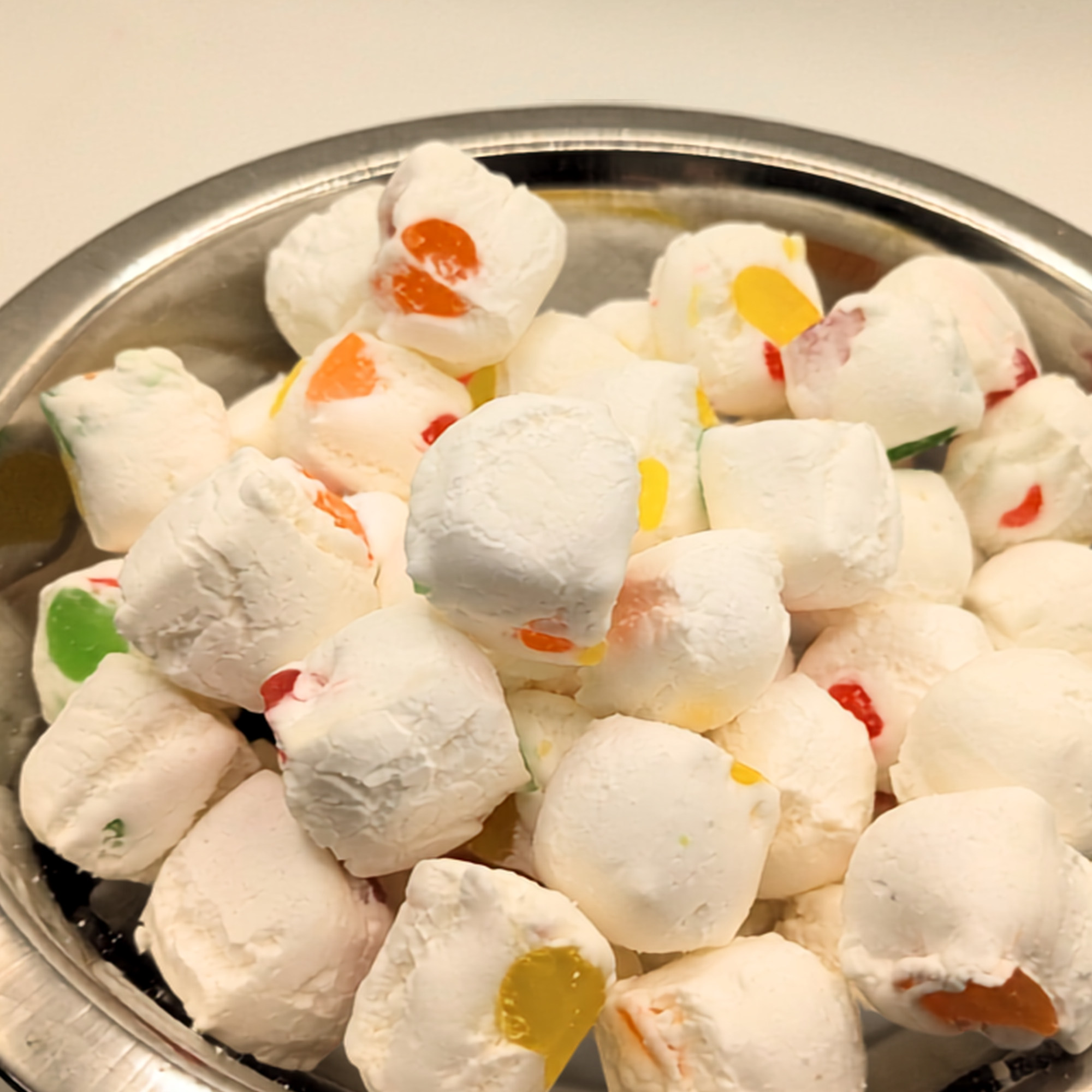 Freeze dried jujube nougats in a metal bowl