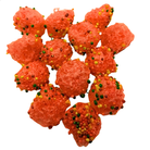 A pile of bright orange-red sugar-coated candy balls, each topped with small multicolored sprinkles, shown on a plain white background.