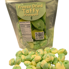 Bag of freeze dried pineapple taffy with candy in front