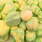 Freeze dried pineapple taffy, which is light green and yellowish green with a light and fluffy texture