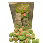Bag of freeze dried watermelon taffy with candy piled in front